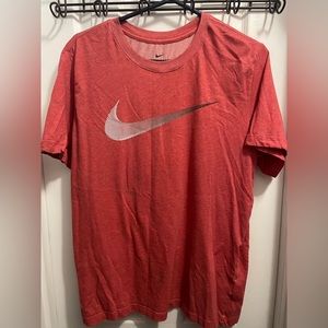 Red short sleeve Nike tee w/ white swoosh